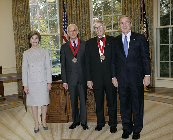 President George W. Bush and Laura Bush stand with 2005 National Humanities Medal recipients Lewis Lehrman and Richard Gilder